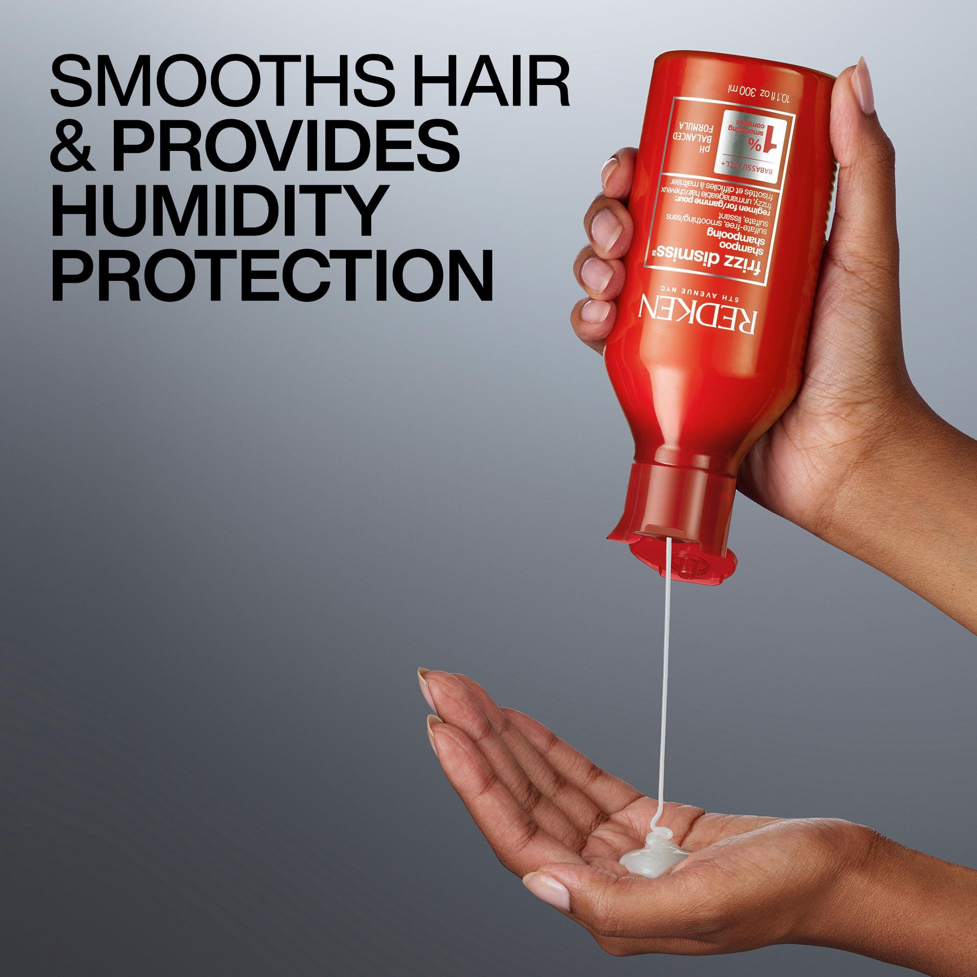 Creamy lather from Redken Frizz Dismiss smooths strands while cleansing.