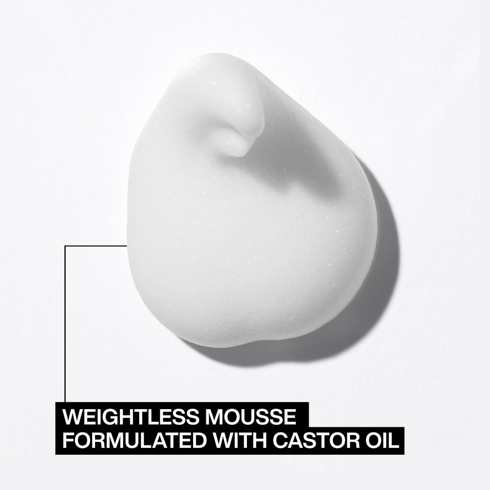 Redken Full Volume Mousse in day-use setting for lift.