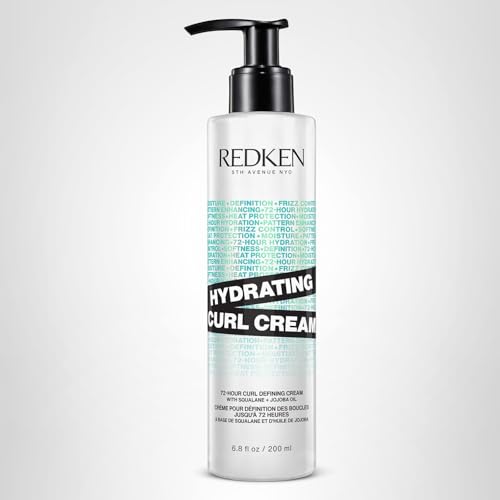 Redken Hydrating Curl Cream on wet hair ready for detangling.