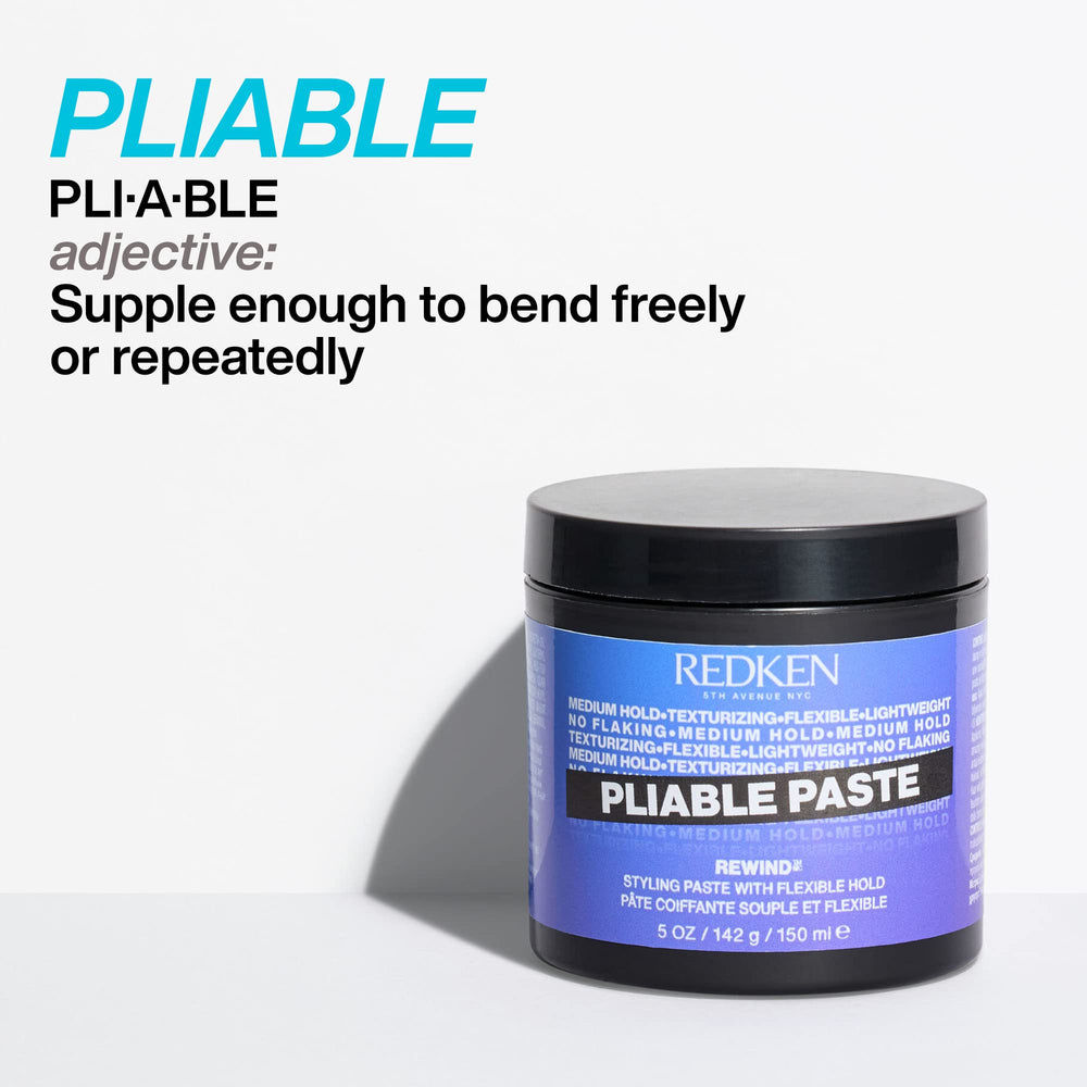 Long layered hair styled with Redken Pliable Paste for defined texture.