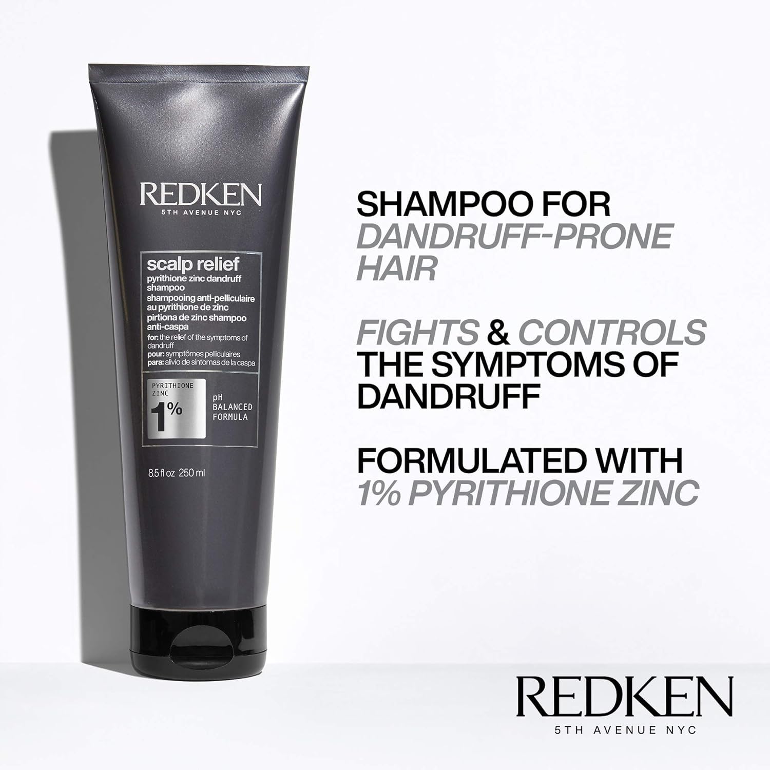 Close-up of Redken label highlighting pyrithione zinc for anti-flake action.
