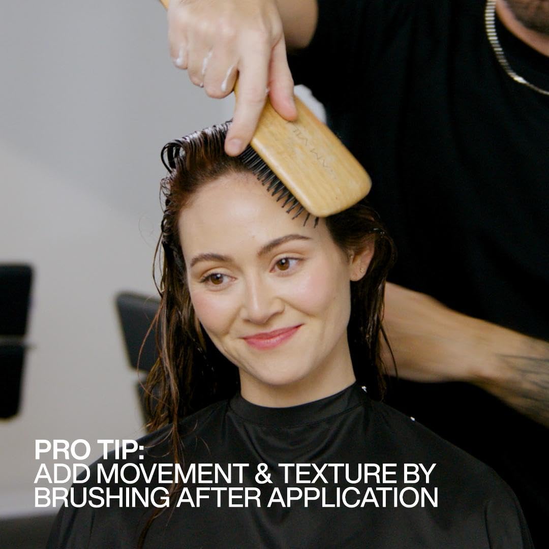 Redken Stay High Mousse being blow-dried into a full look