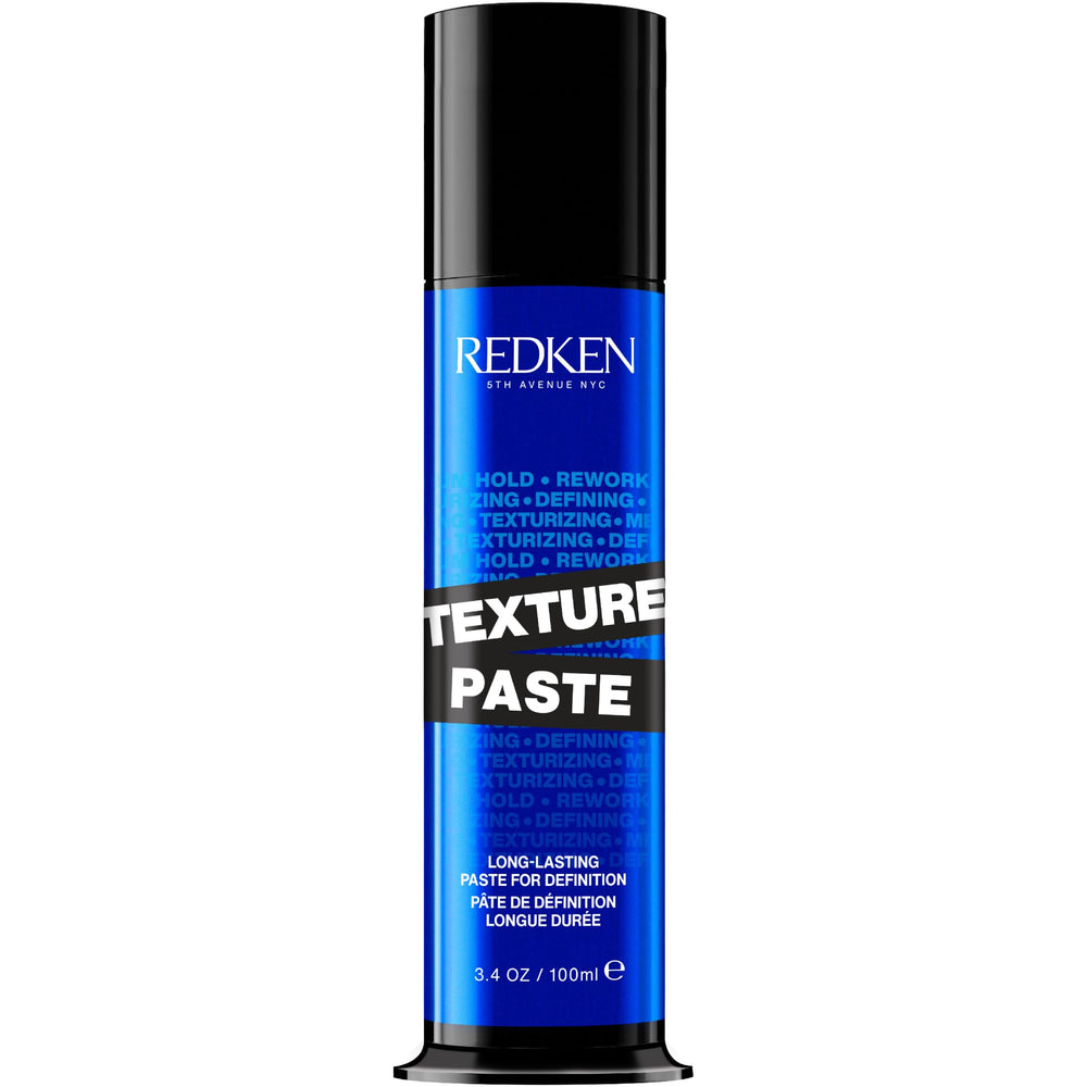 Redken Texture Paste long-lasting bottle pour showing texture and flexible hold.