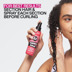 Redken Thermal Spray 22 heat protection up to 450°F shields hair during styling.