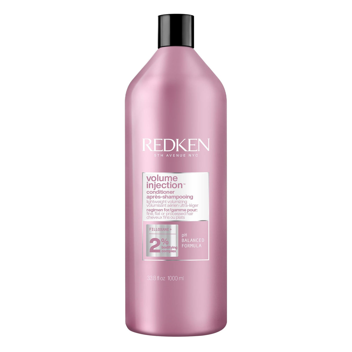 Redken Volume Injection Conditioner bottle pour demonstrates root lift potential