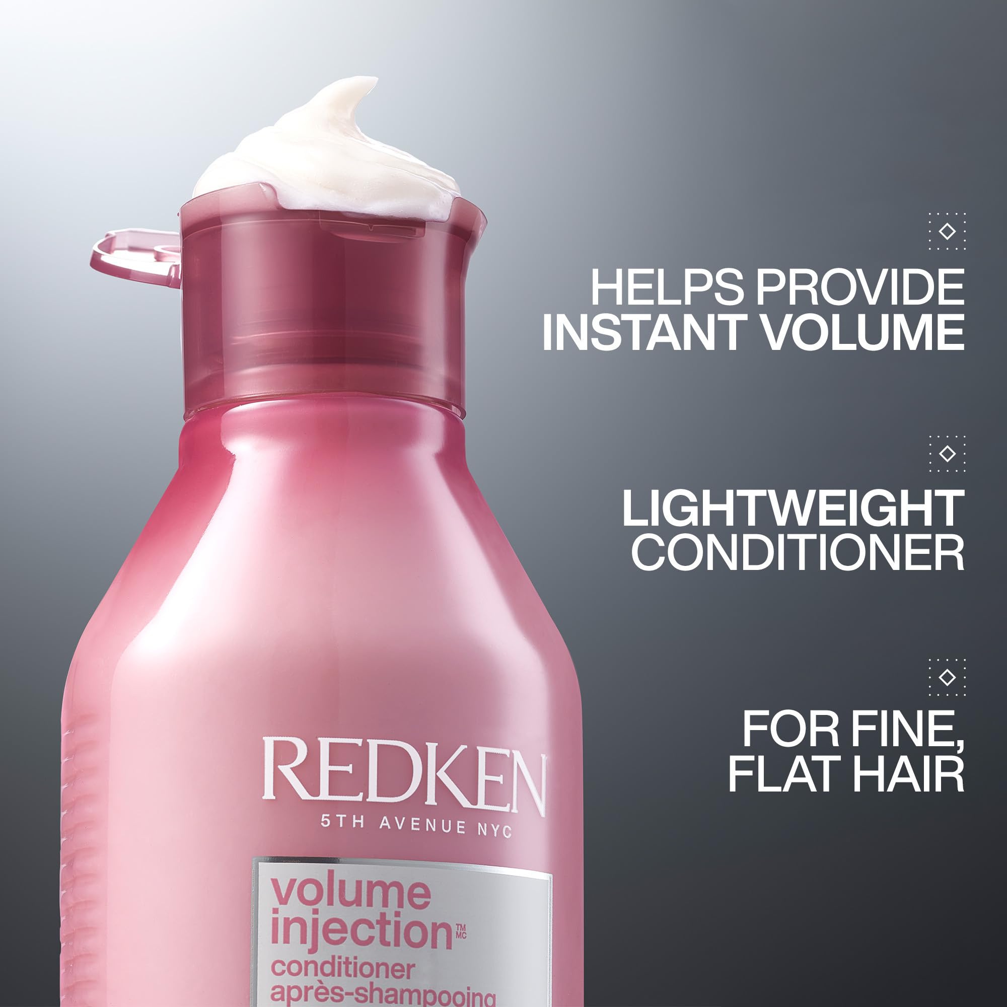 Redken Volume Injection Conditioner label closeup highlighting paraben-free formula and bodifying complex.