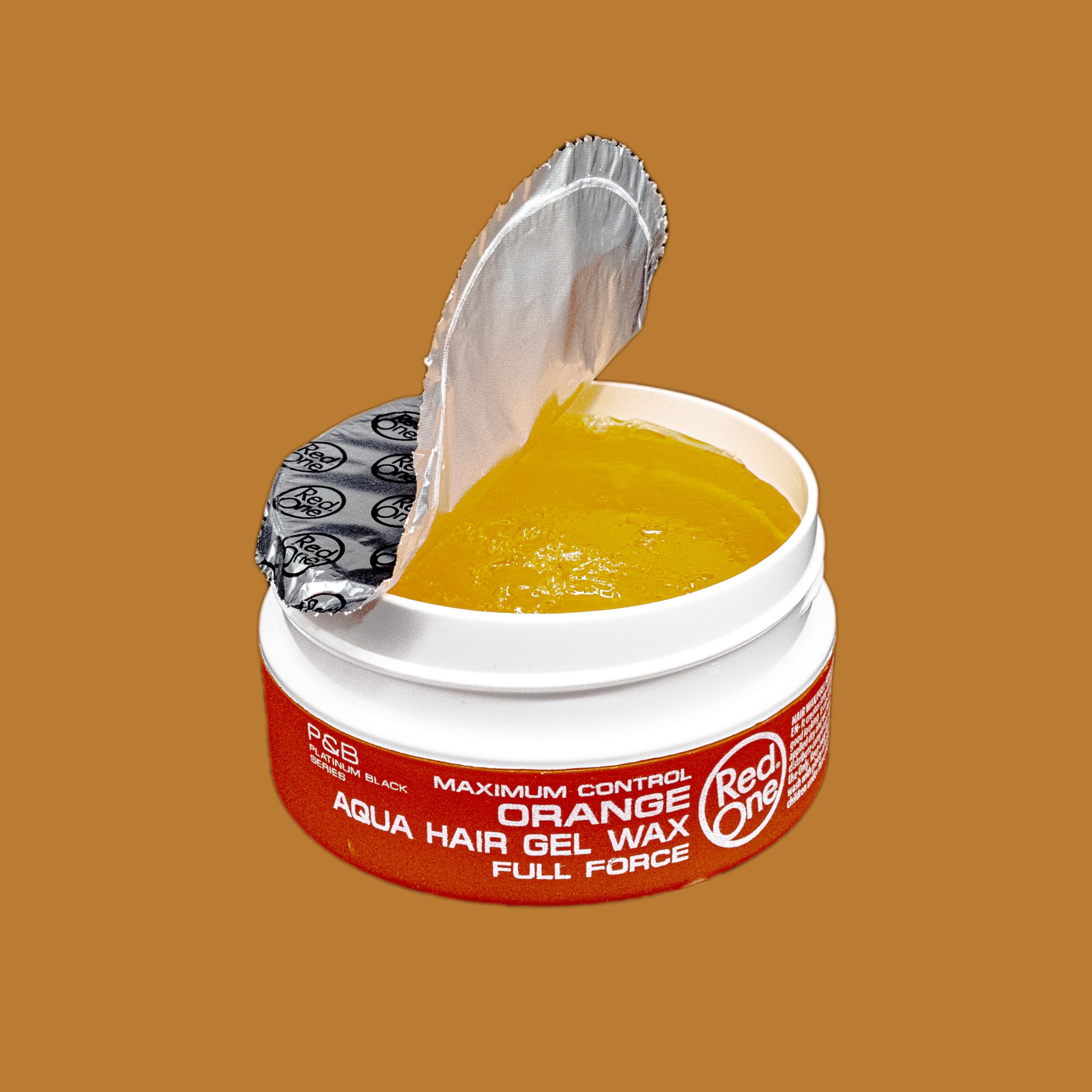 Redone Hair Wax Orange bottle label detail emphasizing high shine finish.