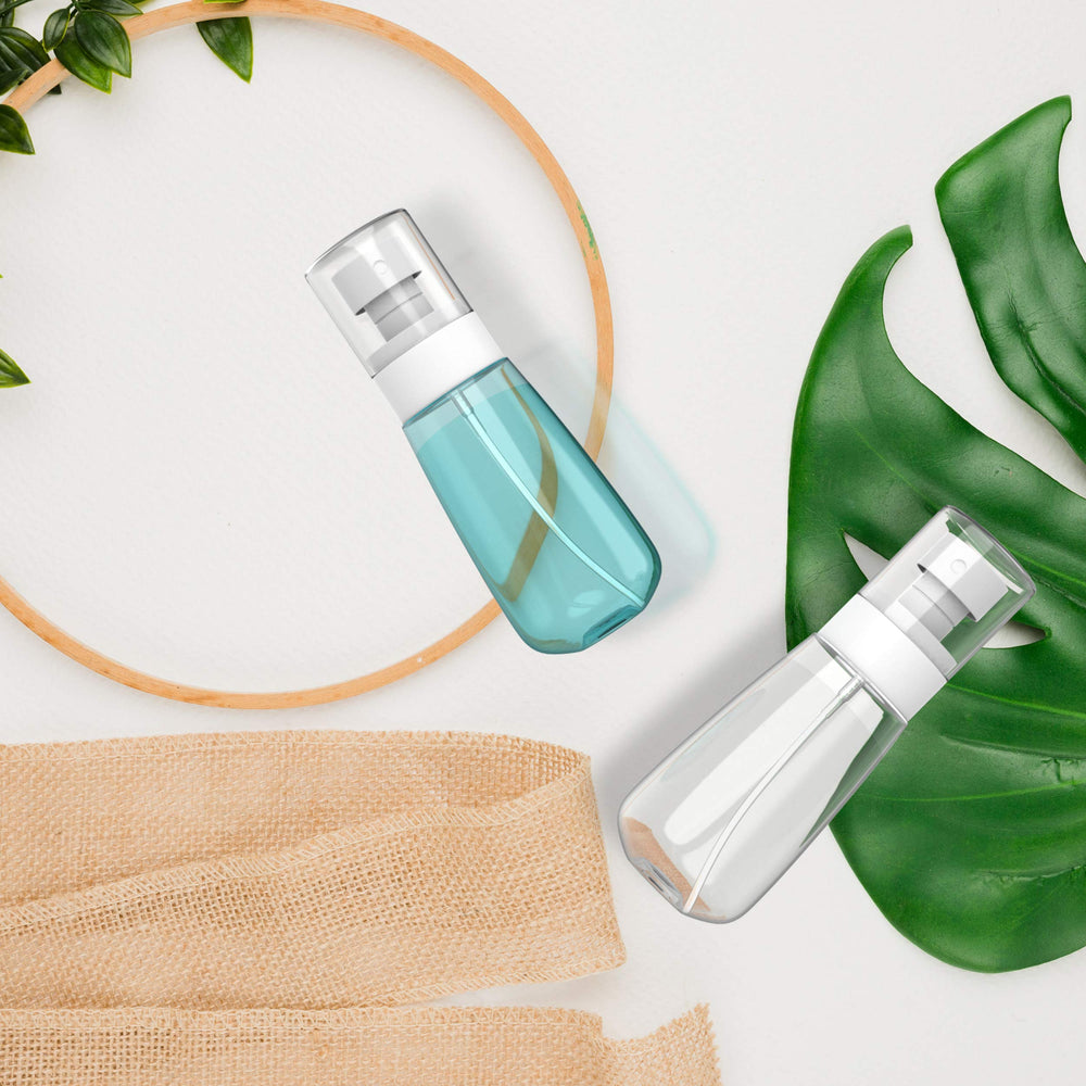 RELANOR fine mist spray nozzle delivering gentle, even droplets for facial or hair use.