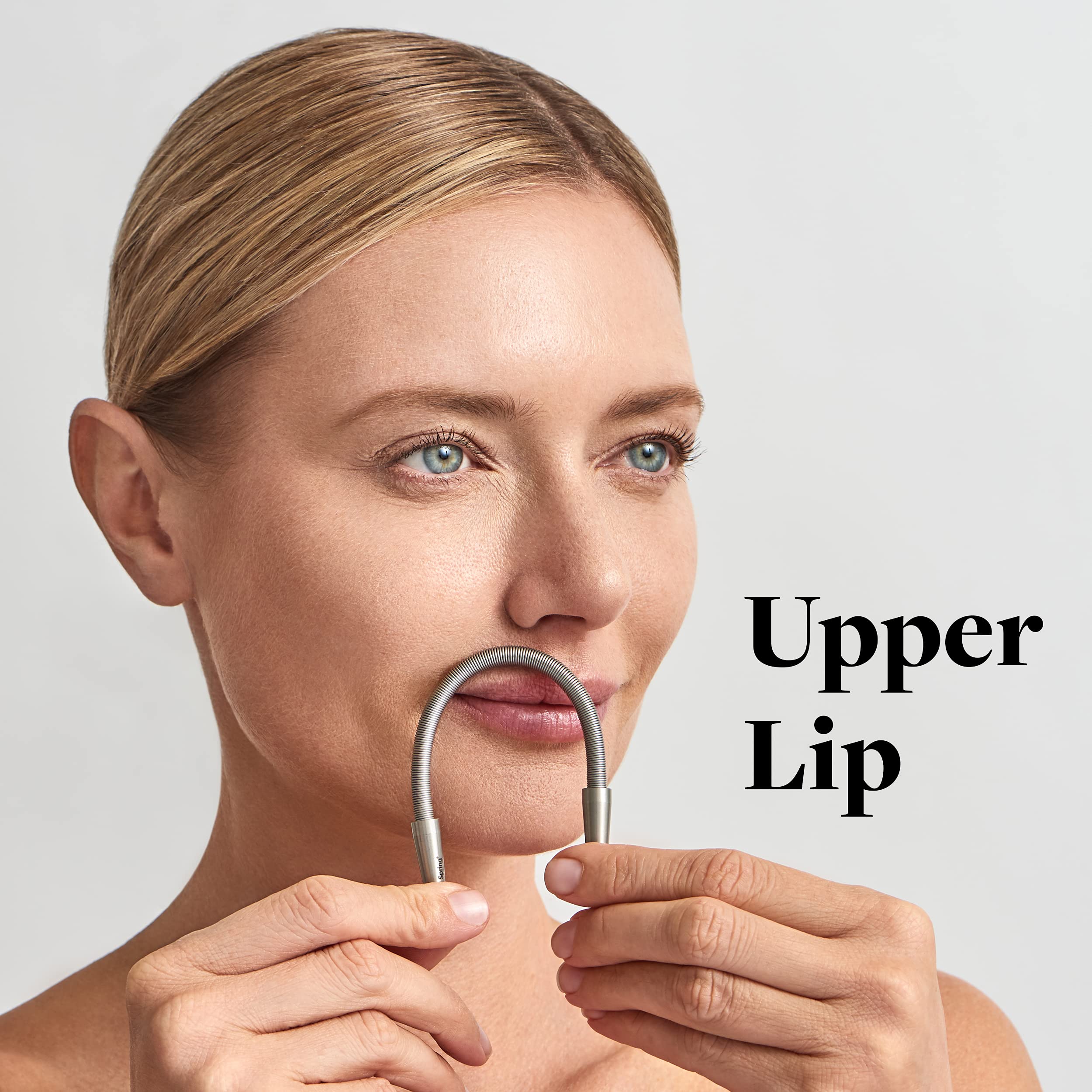 R.E.M Spring facial hair remover used on upper lip for precise root-level removal.