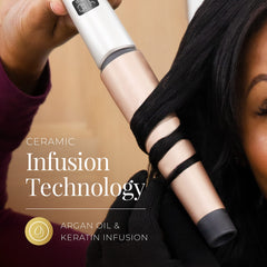 Remington Shine Therapy curling wand in use creating smooth, glossy waves.