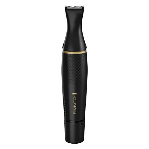 Remington detail trimmer trimming dry hair for precise edges.