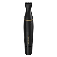 Remington detail trimmer trimming dry hair for precise edges.