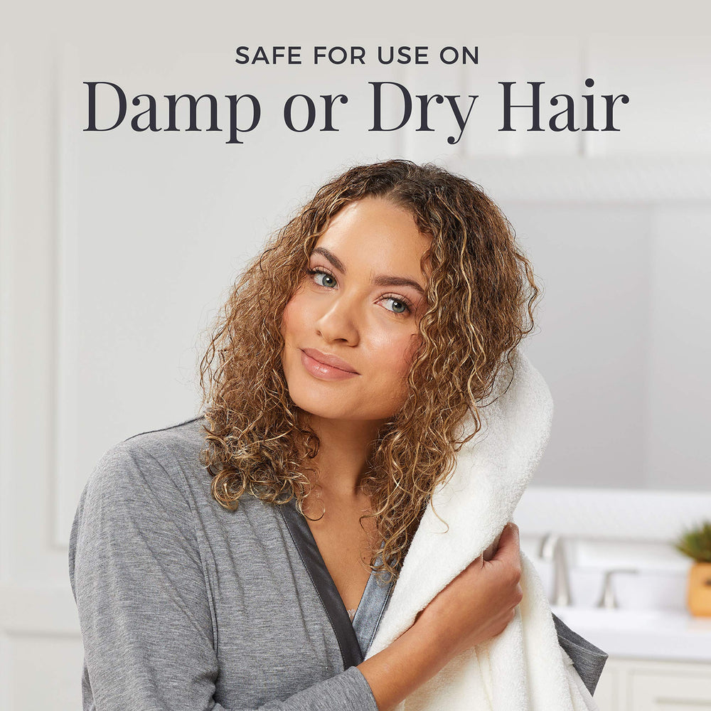Remington Wet2Straight steam icon lights up for damp styling readiness