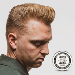 REUZEL Concrete Matte Pomade hair polish look with sharp, polished style.