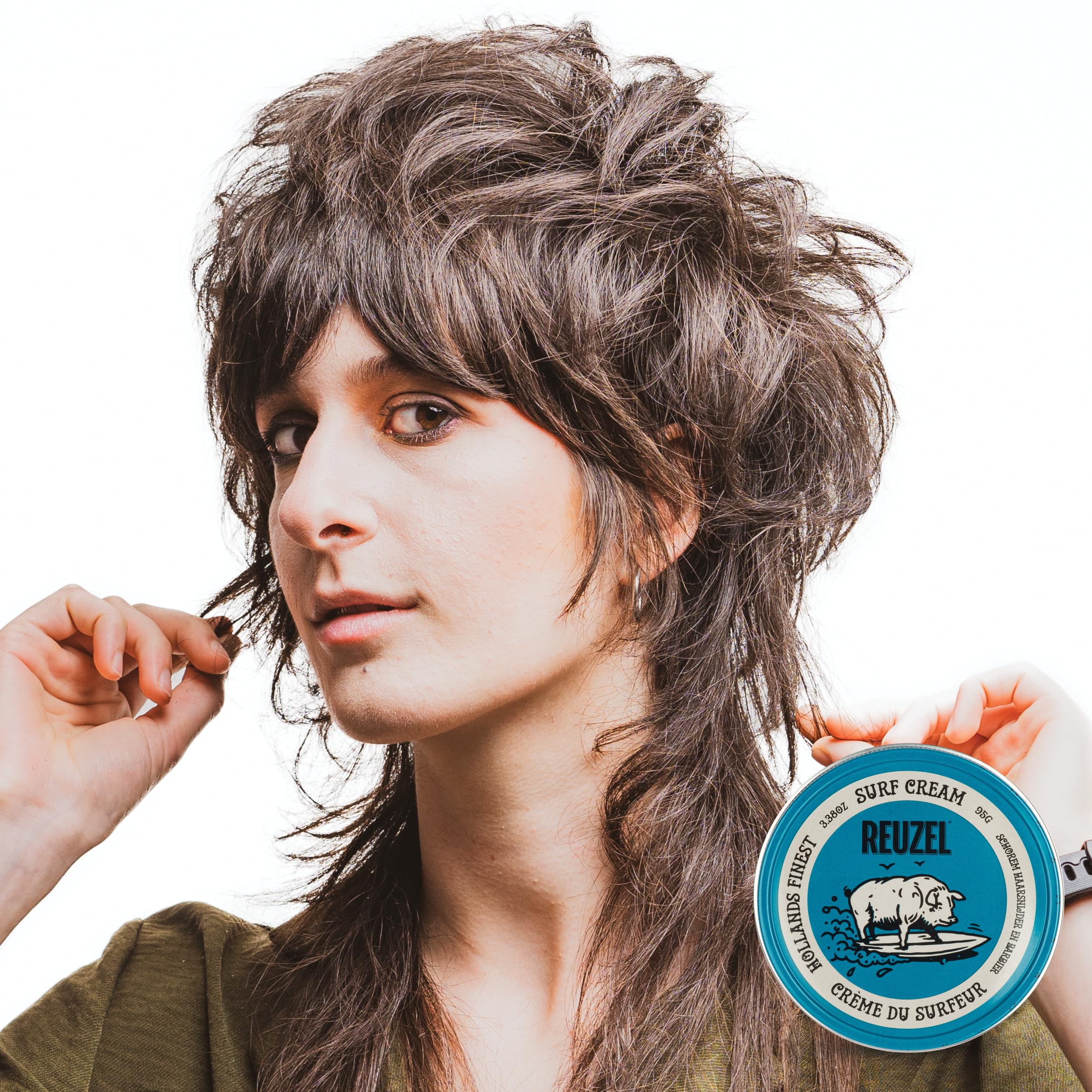 REUZEL Surf Texture Cream on hair with matte finish and lift.
