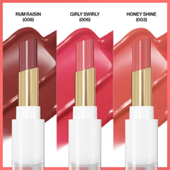 REVLON Glass Shine Balm Rum Raisin swatch reveals rich red-brown shade with glassy finish.
