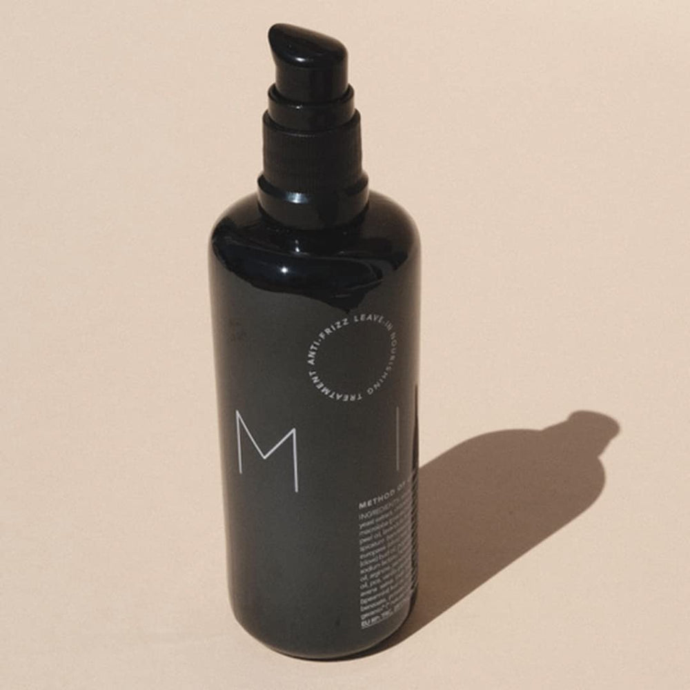 REVERIE 16-oil blend close-up highlights herbal aroma and nourishing oils