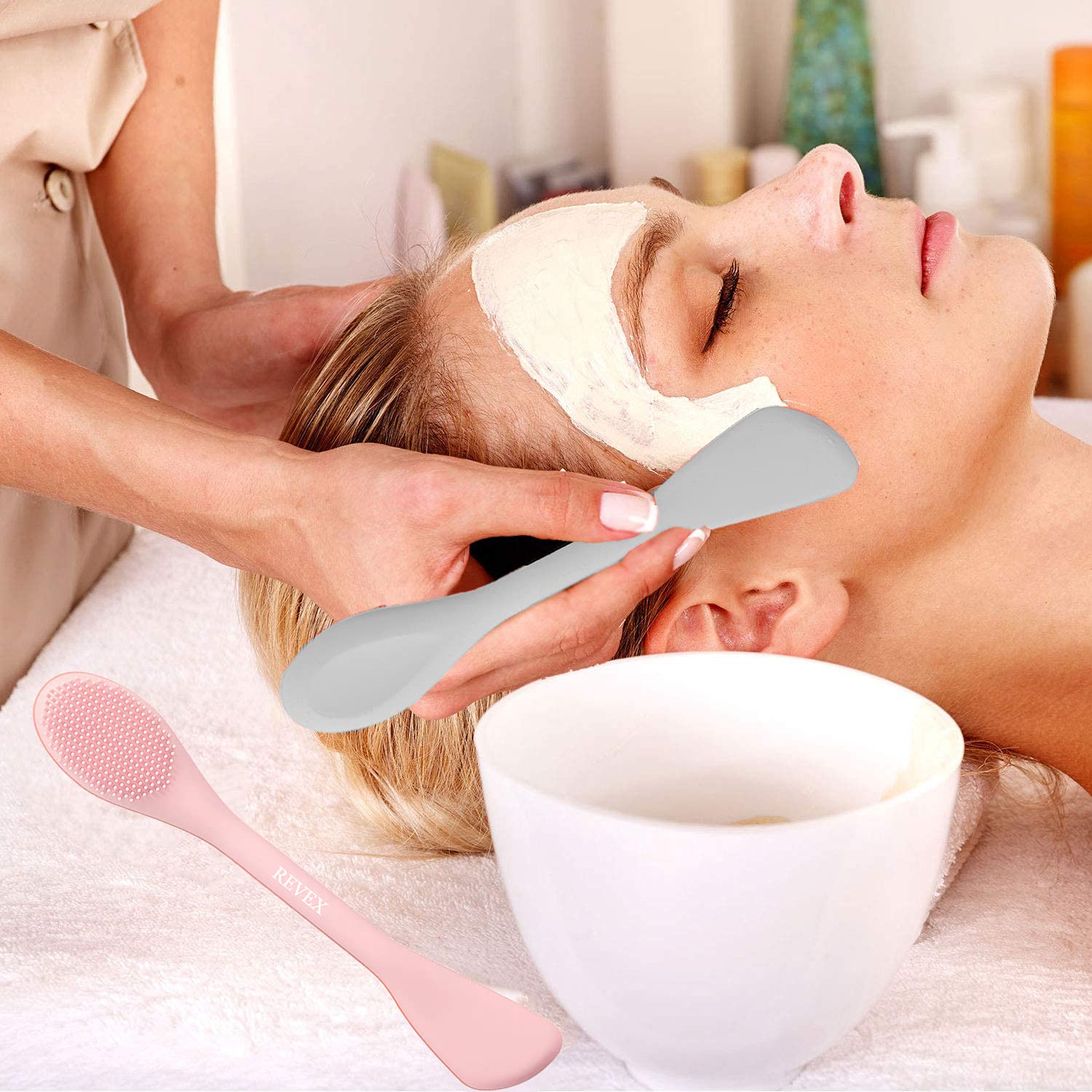 REVEX gray dual-ended brush for even gel spread and cleansing.