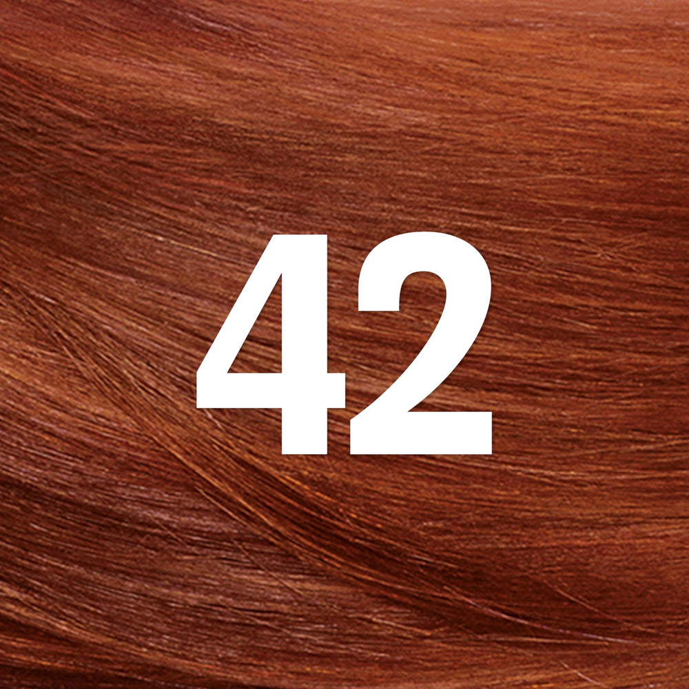 Revlon ColorSilk bond repair complex label closeup highlighting hair repair benefits.