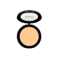 Close-up texture of Revlon ColorStay pressed powder showing seamless, natural-looking coverage.