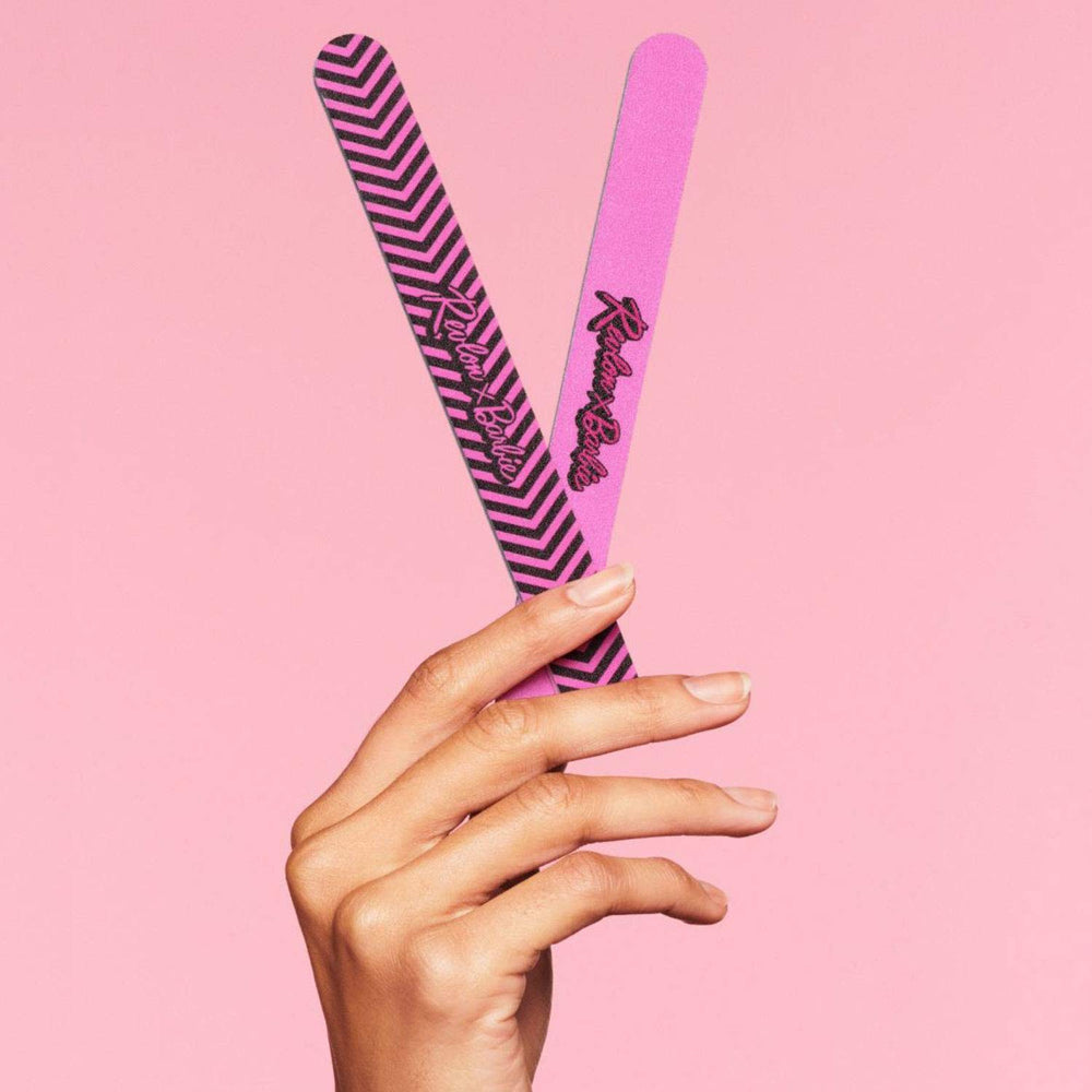 Full-length board in hand, offering a comfortable grip for precise filing.