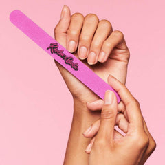 Smoothing surface finishing nails for a refined edge after shaping.