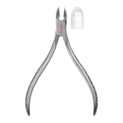 REVLON Full Jaw Cuticle Nipper in hand for controlled, comfortable trimming.