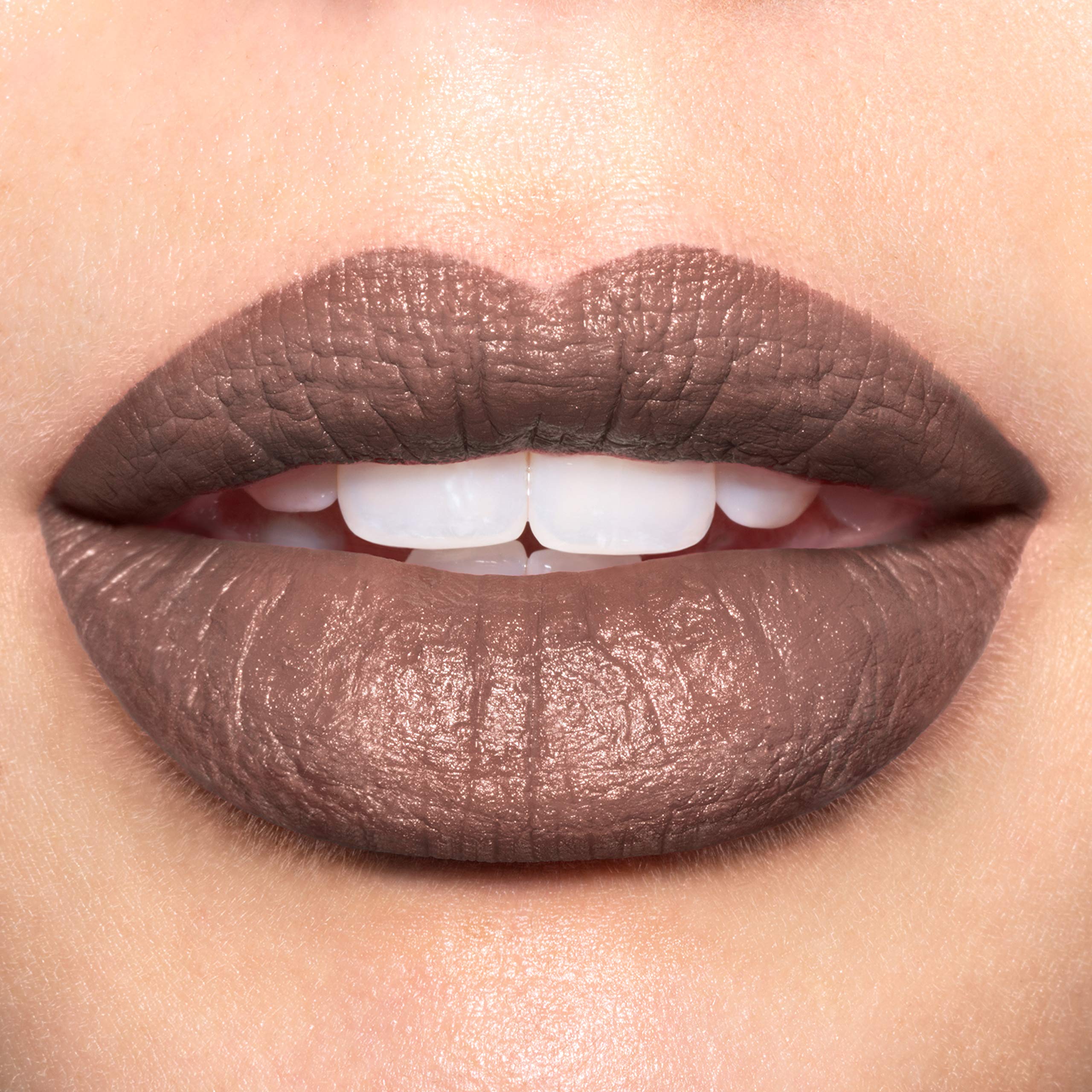 REVLON Luscious Mattes bullet application demonstrates smooth glide and velvety finish.