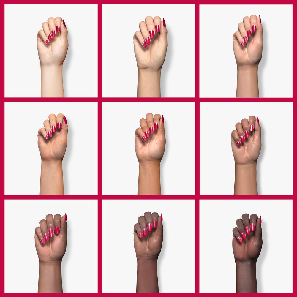 Nail with glossy finish using REVLON Cherries In The Snow close-up.