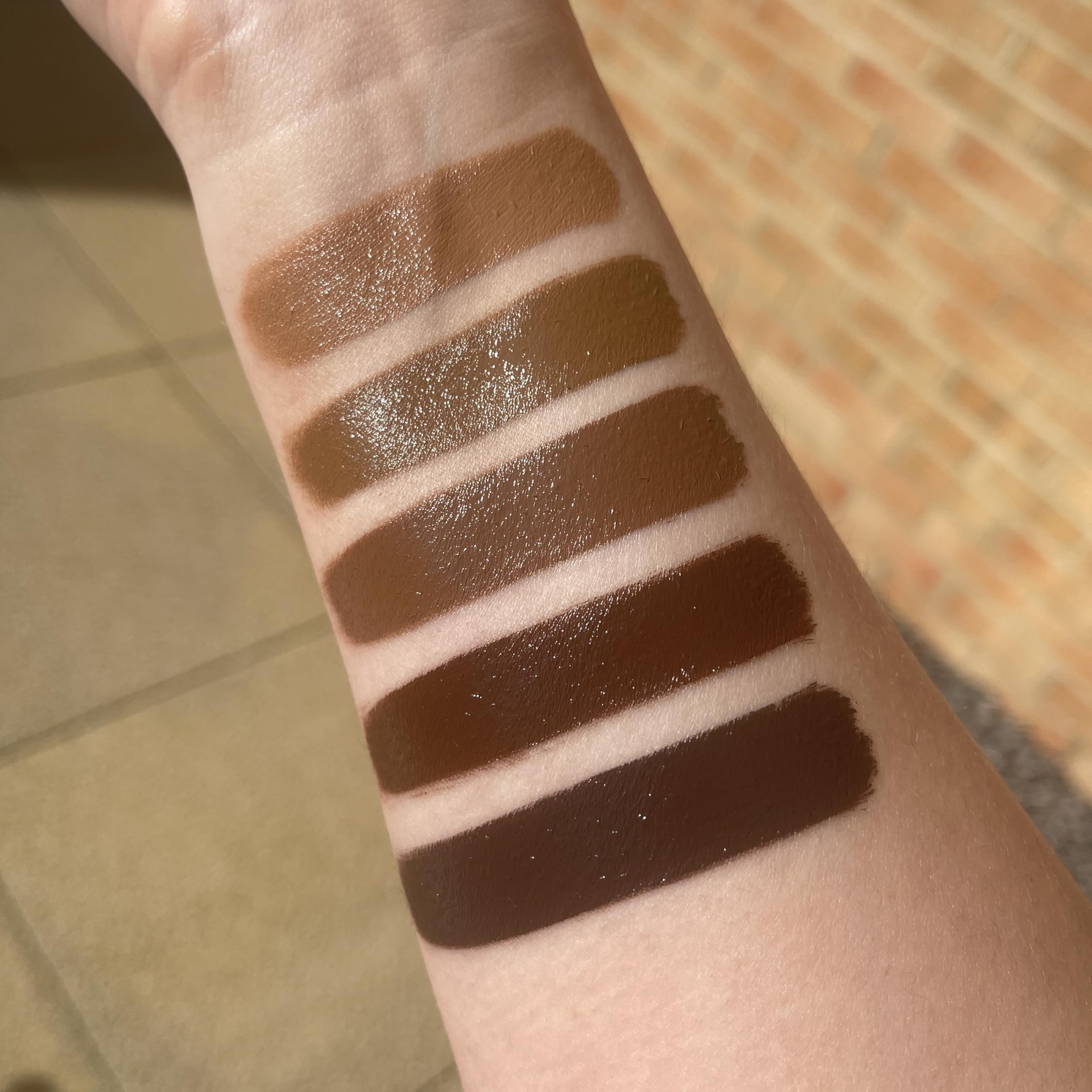 Revolution Beauty London bronzer on forehead and nose for natural radiance