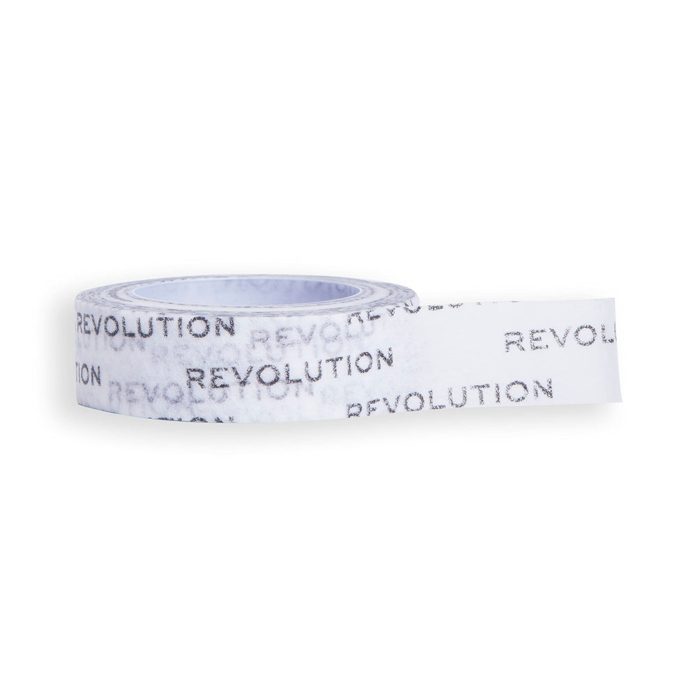 Revolution Beauty London precise-shadow tape roll for clean eyeliner edges.