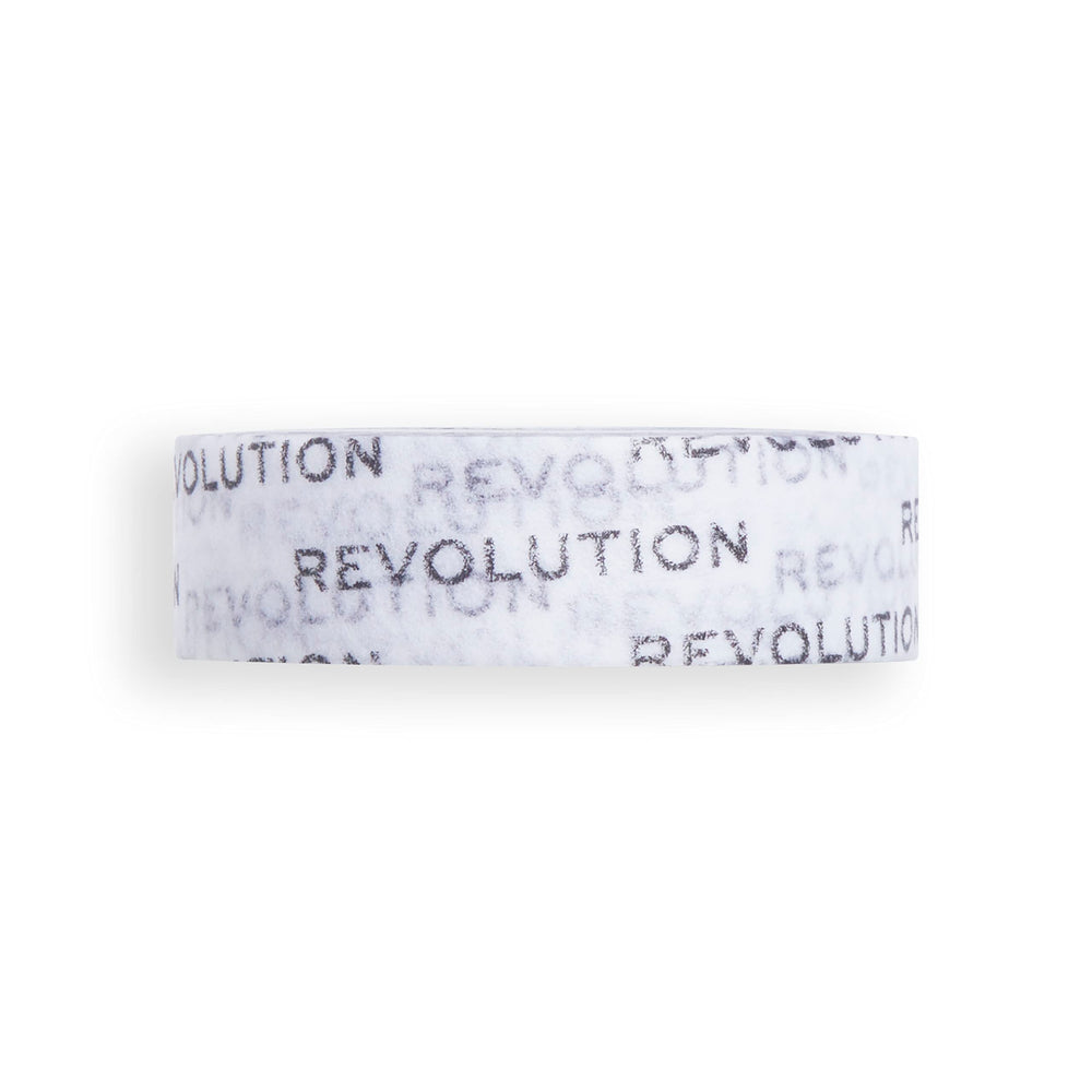 Revolution Beauty London tape applied along the upper lash line to create a sharp flick.