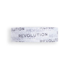 Revolution Beauty London tape applied along the upper lash line to create a sharp flick.