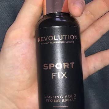 Revolution Beauty London Sport Fix bottle on vanity ready to set makeup.