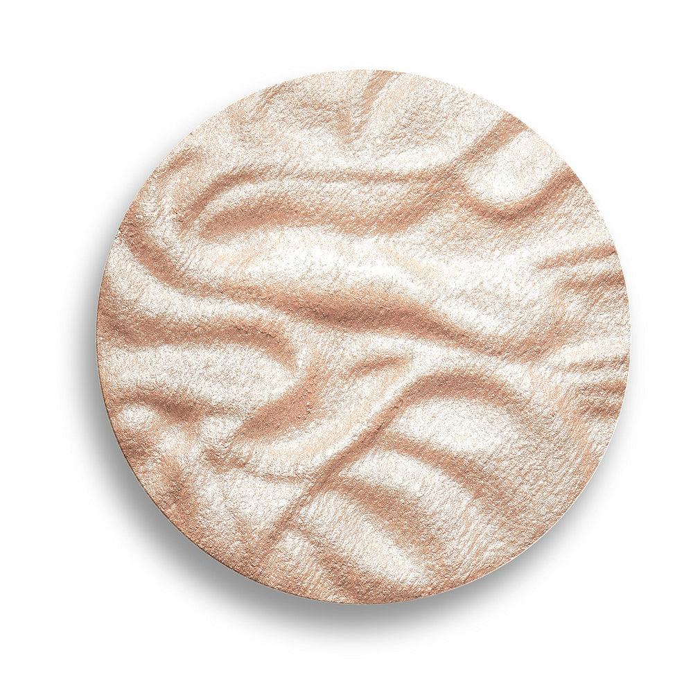 Swift, precise application with a brush for buildable glow by Revolution Reloaded.