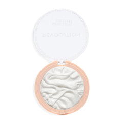 Revolution Set The Tone highlighter compact delivering a radiant glow with silky blendable formula