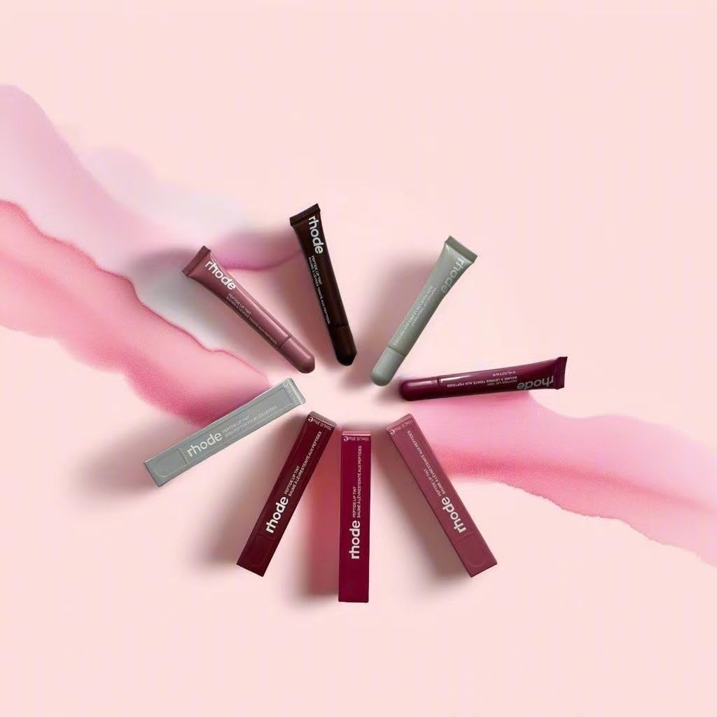 Rhode Gloss Lip Tint Toast on lips for a natural, plush shine