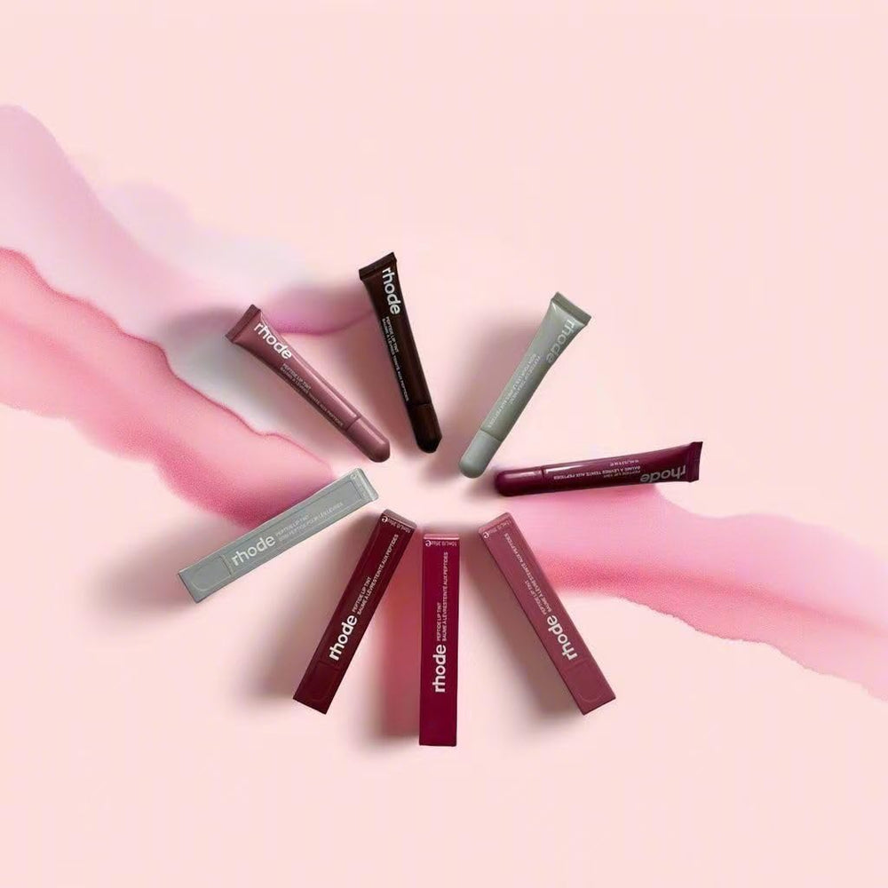 Rhode Gloss Lip Tint Toast on lips for a natural, plush shine
