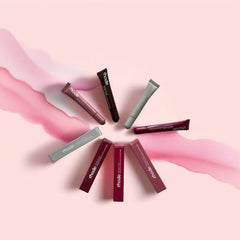 Rhode Gloss Lip Tint Toast on lips for a natural, plush shine