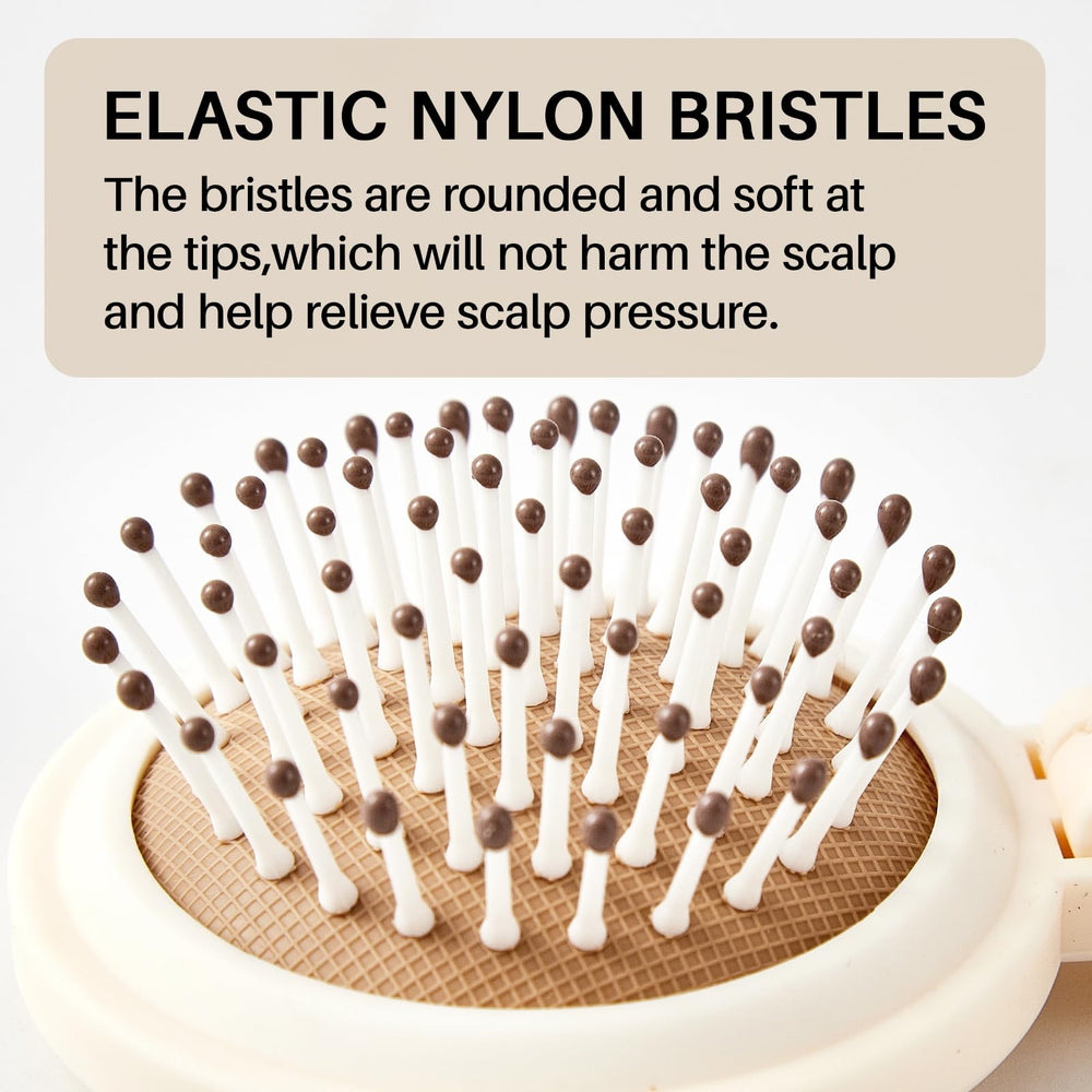 RHOS hair brush with nylon bristles detangles smoothly to minimize tugging.