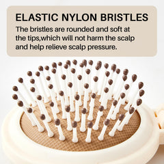 RHOS hair brush with nylon bristles detangles smoothly to minimize tugging.