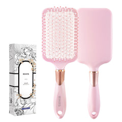 RHOS Paddle Brush with pink handle gently detangles knots without pulling.