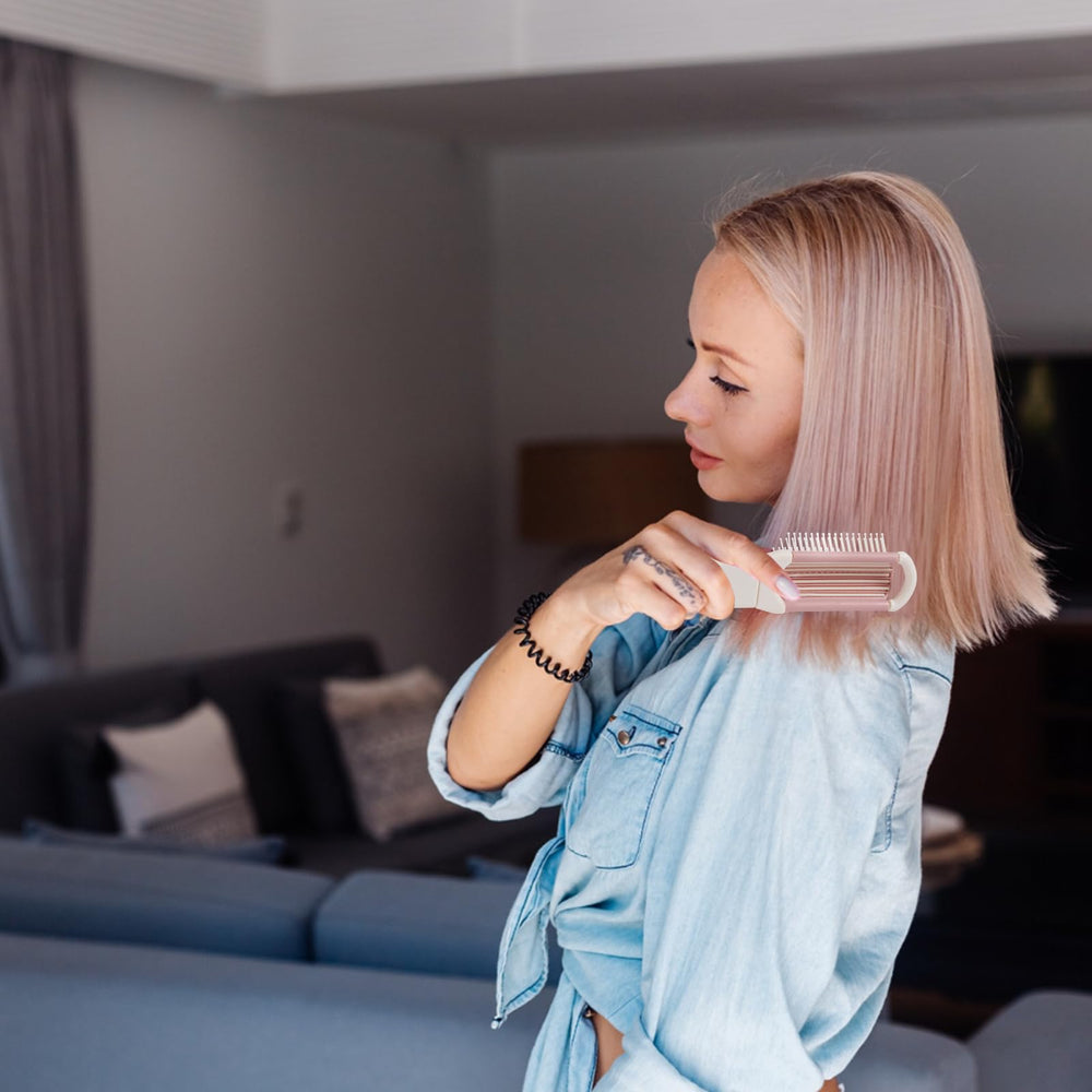 RHOS pocket-size travel brush fits in a purse or pocket.