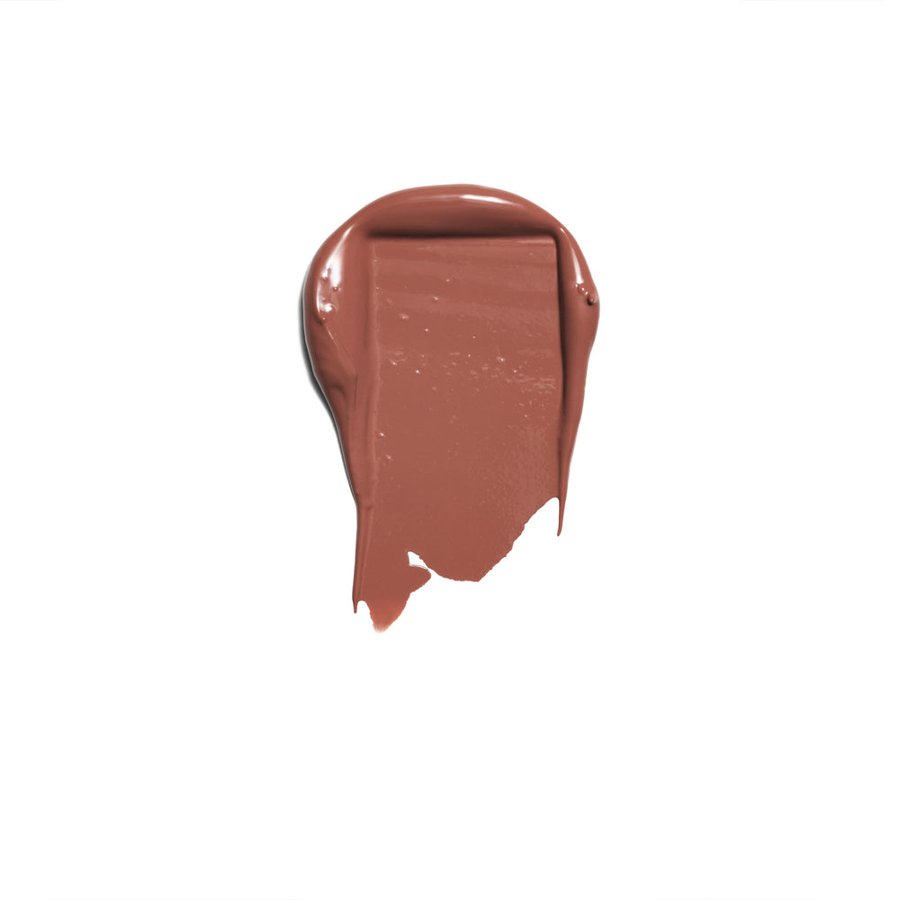 Rimmel Lasting Finish Lipstick 60 Cappuccino swatch on arm shows buildable color.
