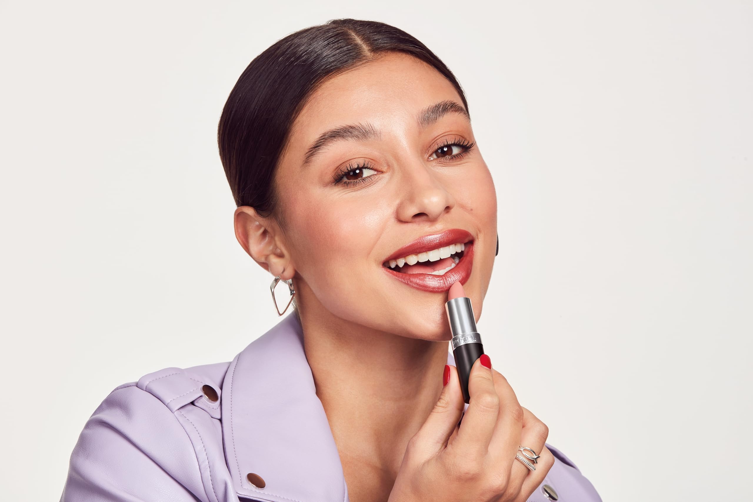 Rimmel Lasting Finish Lipstick Candy close-up shows radiant pigment.