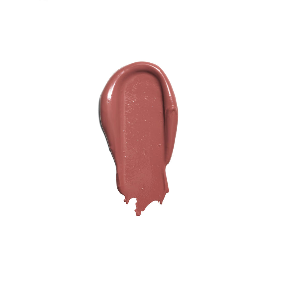 Rimmel Lasting Finish Lipstick Natural Crush swatch on lips showing natural glow.