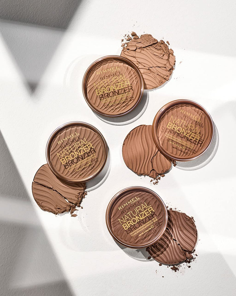 Rimmel Natural Sun Light swatches in three shade options.