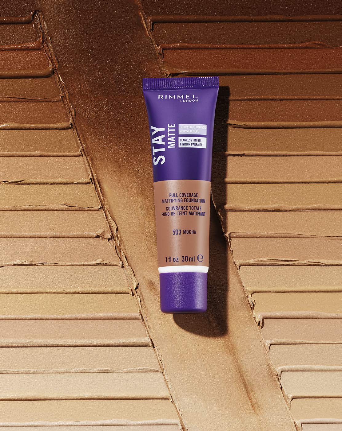 Rimmel Stay Matte Liquid Mousse oil-free formula shown on skin for long-lasting matte look.