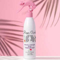 Rizos Curls coconut oil formulation nourishes and adds shine.