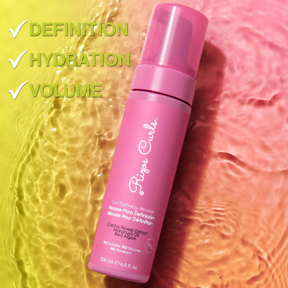 Rizos Curls mousse cares for color-treated hair with a gentle sulfate-free formula.